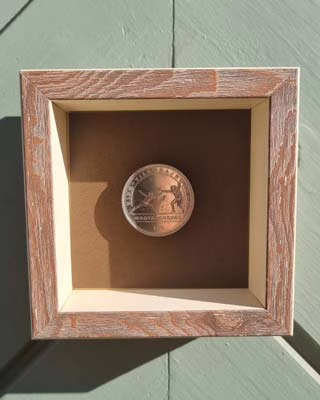 erme_kepkeretben érme keretben, keretezett érme pénz